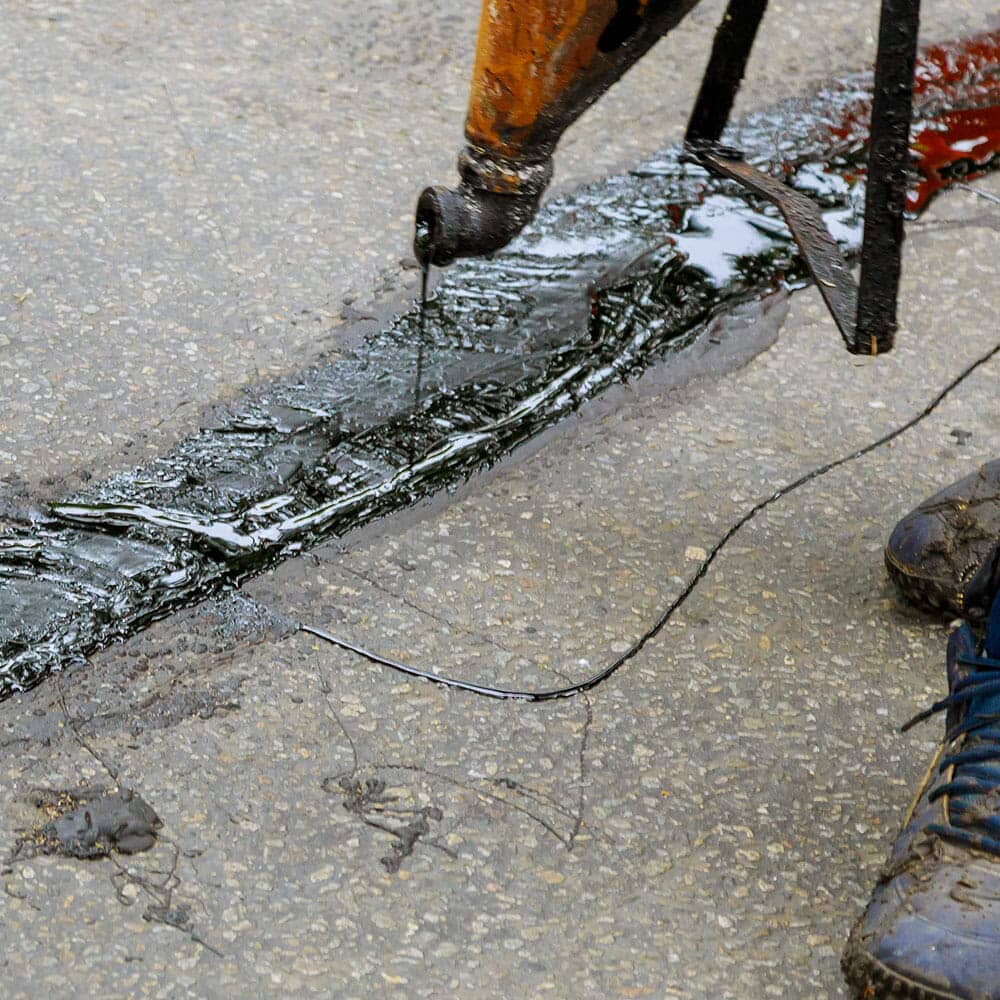 asphalt crack repair - filling in cracks in asphalt